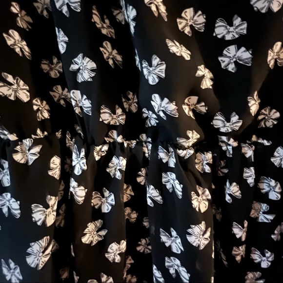 Ricki’s black collared dress with bow pattern - Picture 3 of 5